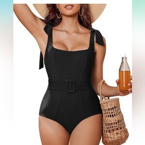 One piece black bathing suit with adjustable belt